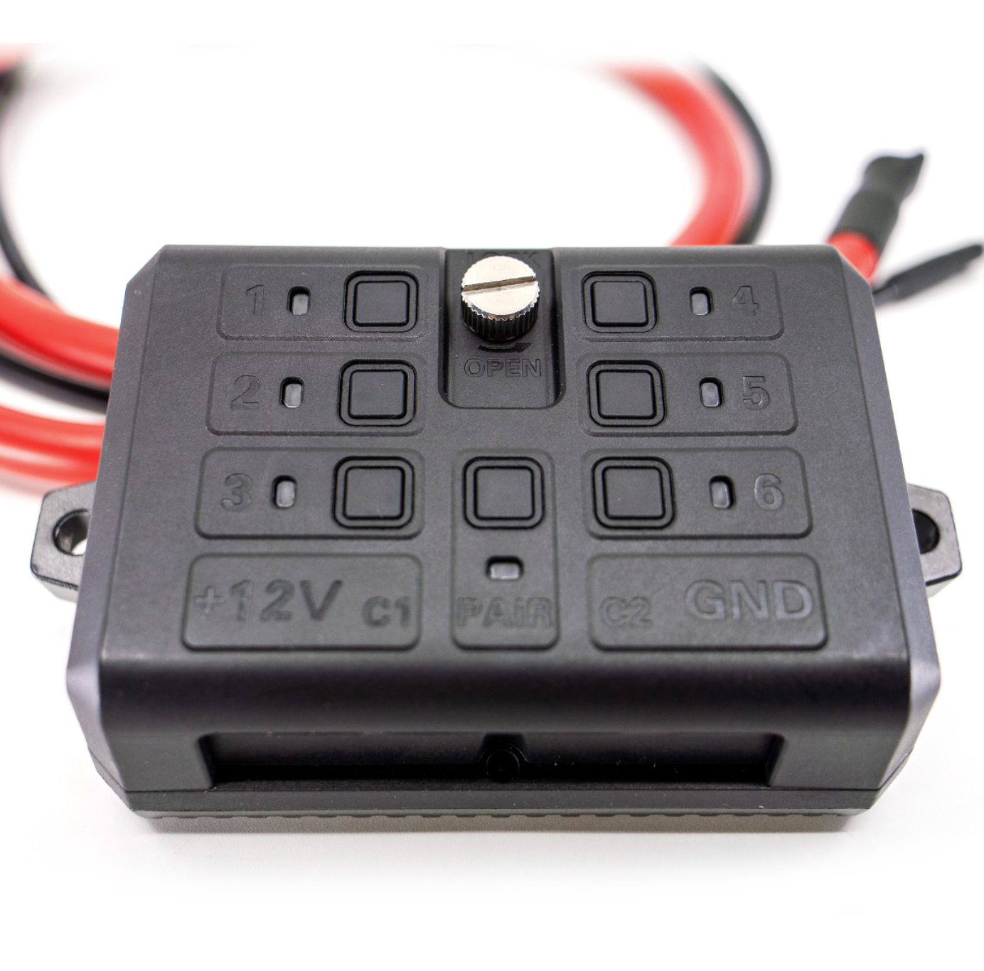 Shows the surface of the DMD Power Box with hardware buttons and indicator lights.