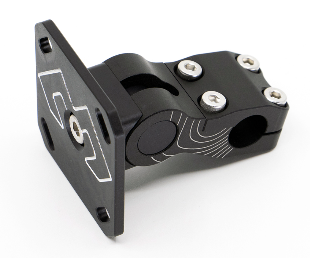 The image shows the DMD 12mm AMPS Bracket Short SE, a compact mounting bracket with minimal visible screws and an adjustable AMPS plate. 