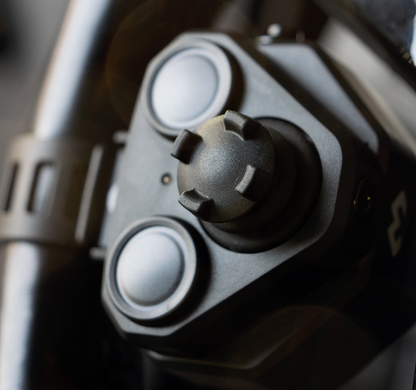 Shows DMD Remote for overlander and 4x4 vehicles mounted on steering wheel